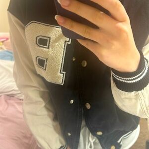 Jean, black and cream, varsity jacket